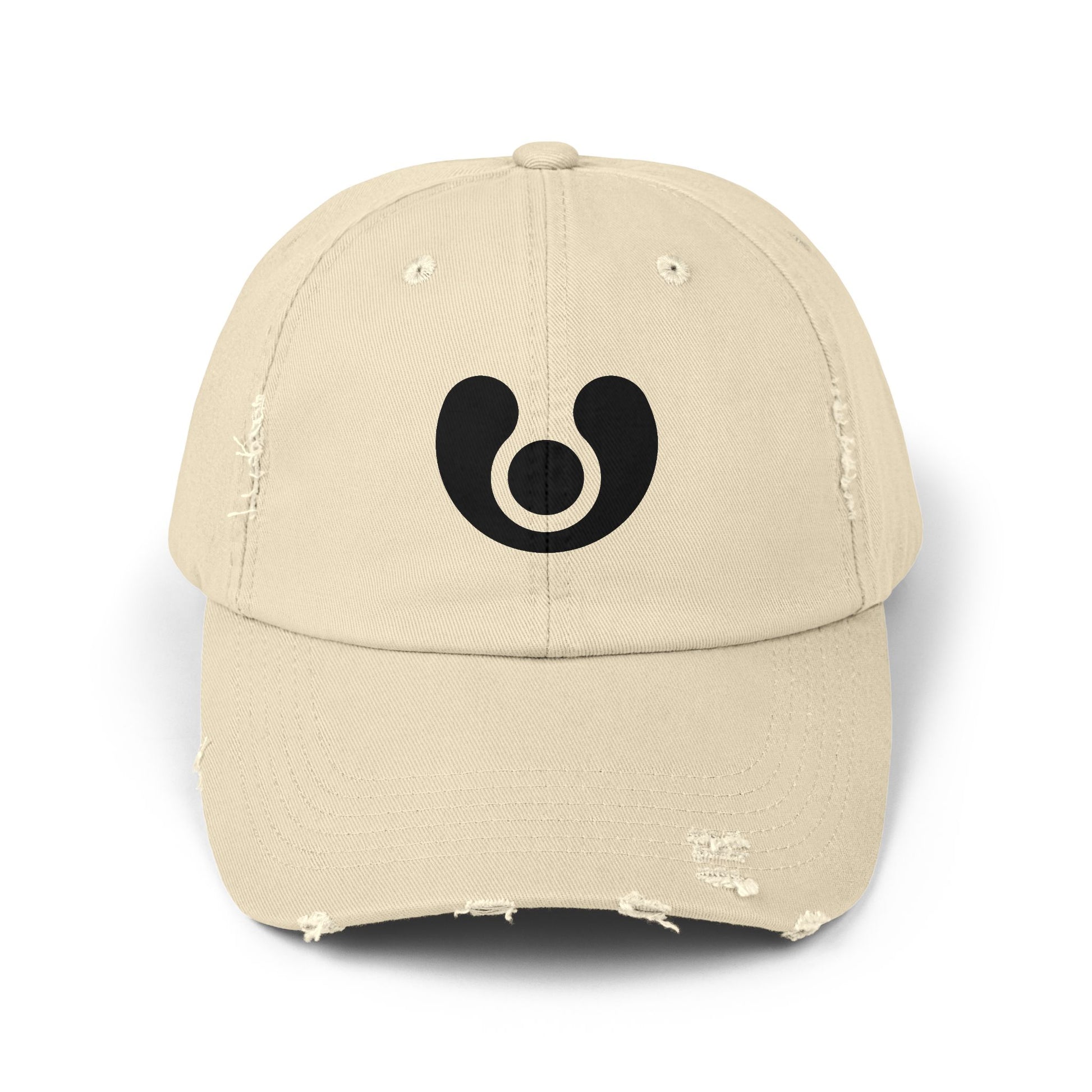 beige cap with a white circular logo