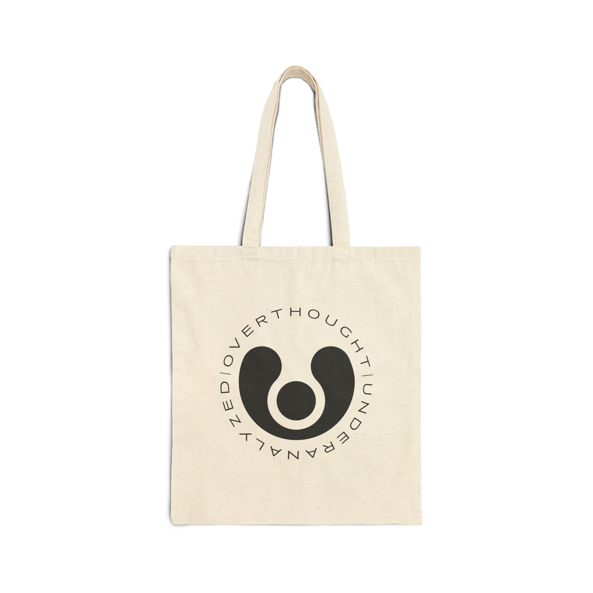 white cotton tote bag with a circular logo and graphic design on the front.